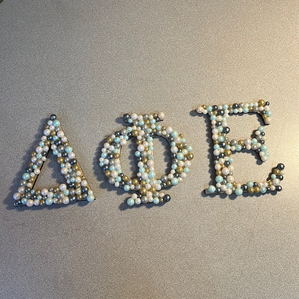 Delta Phi Epsilon letters